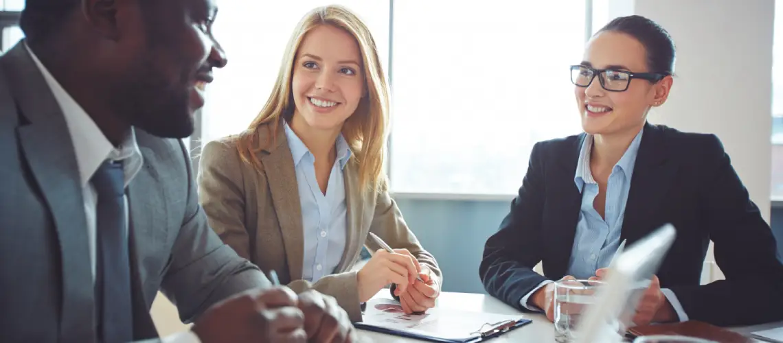 Business professionals discussing business valuation in Brisbane